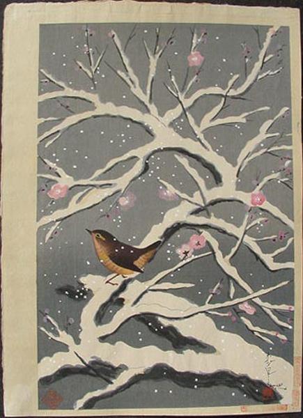 Bird on snowed cherry tree