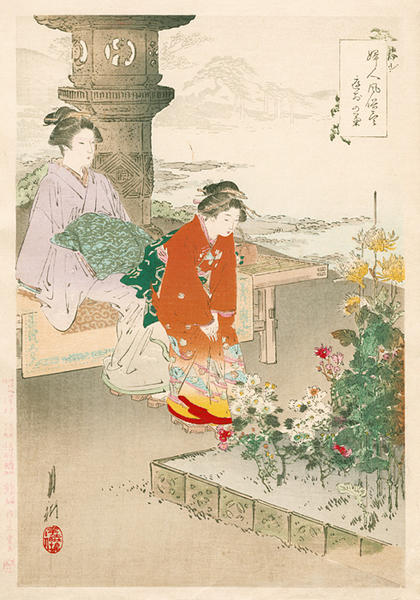 Two ladies watching chrysanthemum flowers in the gardens