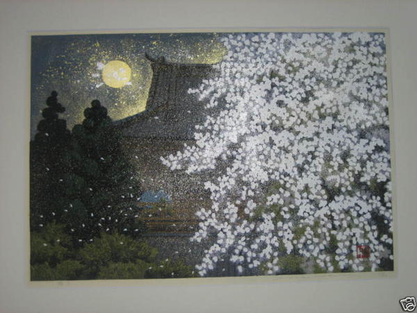 Temple and cherry blossoms on a sunny day