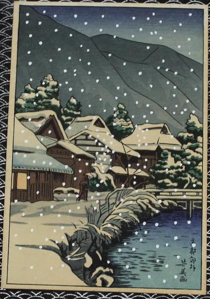 Snowy Village at Night