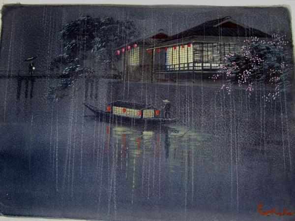 Boat at night in rain