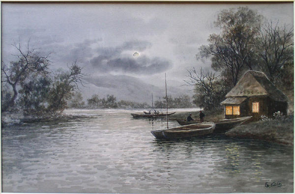 Boats on river at night