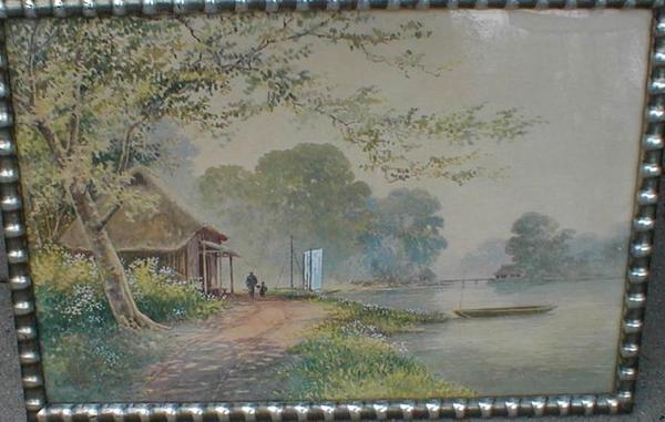 Hut beside river with boat