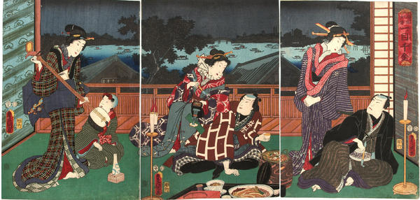 Actors having a dinner party with geishas