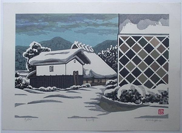 house in the snowy grip of winter