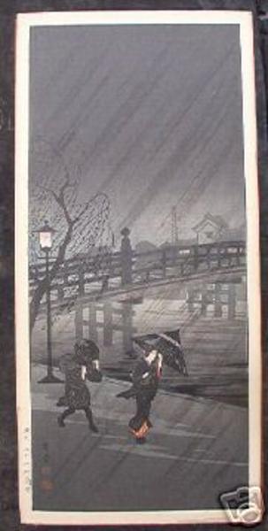 Bridge on rainy night