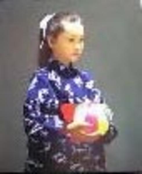 Unknown- child holding item