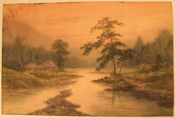 Farmlet beside stream among misty mountains