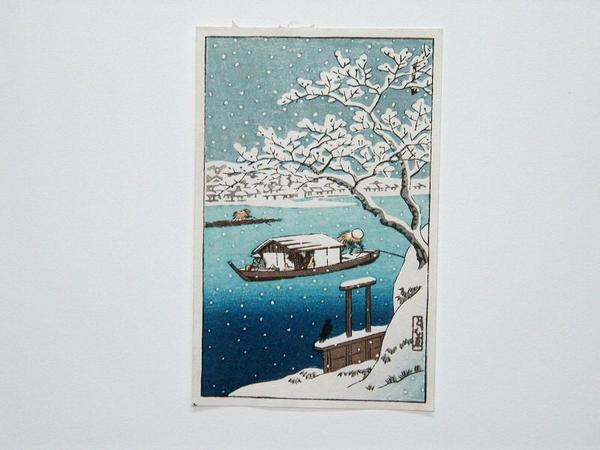 River Sumida in snow; house-boat