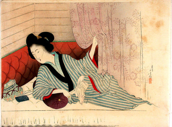 Woman resting on a futon
