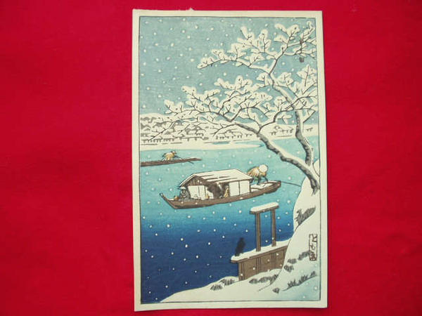 River Sumida in snow; house-boat
