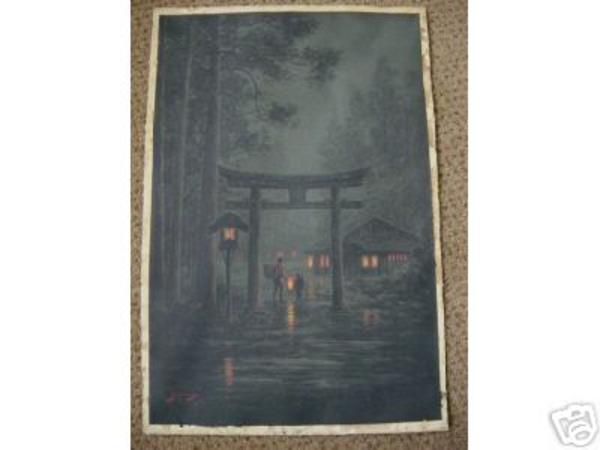Torii and village and pilgrims at night