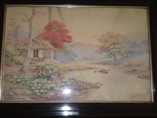 House by stream in autumn