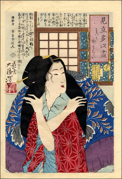 A young woman looking at the falling snow
