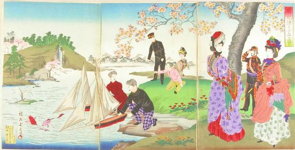 Boys floating boats on a pond