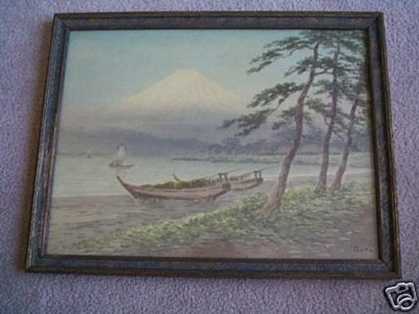 Boats on shore near Fuji