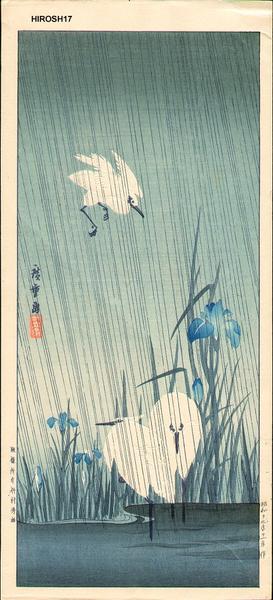 Cranes in the rain