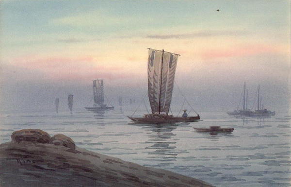 Sailboats on misty ocean