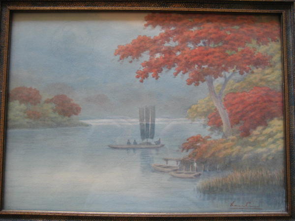 Sailboat on river in autumn