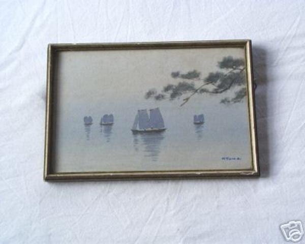 Four fishing boats on a calm lake