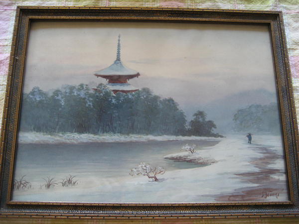 Pagoda by river in winter