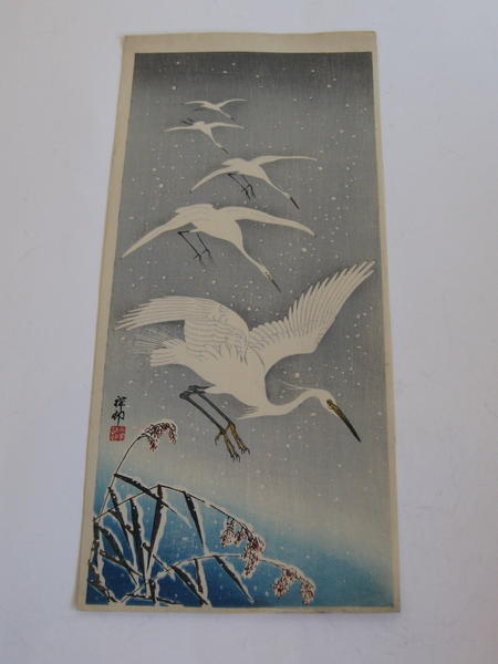 Flying Herons in Snow