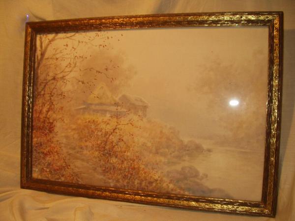 Autumn village by river