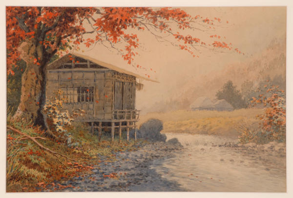 Rural home and running stream in Autumn